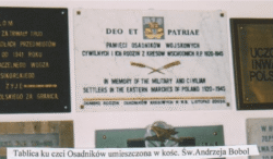 Plaque in memory of Settlers displayed in the church of St. Andrew Bobola, London. Dedicated 2003.